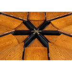 Wooden segments radiate from a black metal hub, forming a star pattern on Sarreid's Casual Tobacco Jupe Dining Table.