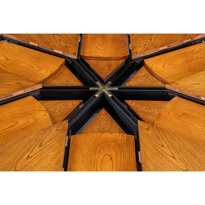 Wooden segments radiate from a black metal hub, forming a star pattern on Sarreid's Casual Tobacco Jupe Dining Table.