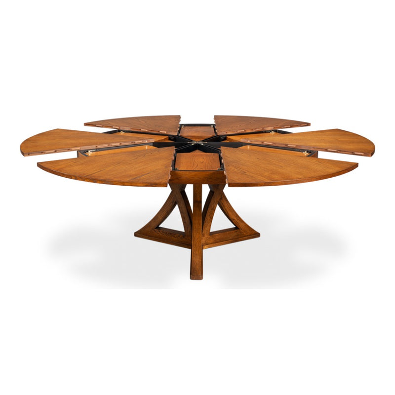 Sarreid, Ltd. Casual Tobacco Brown Finish Medium Jupe Dining Table with starburst design and partially extended leaves.