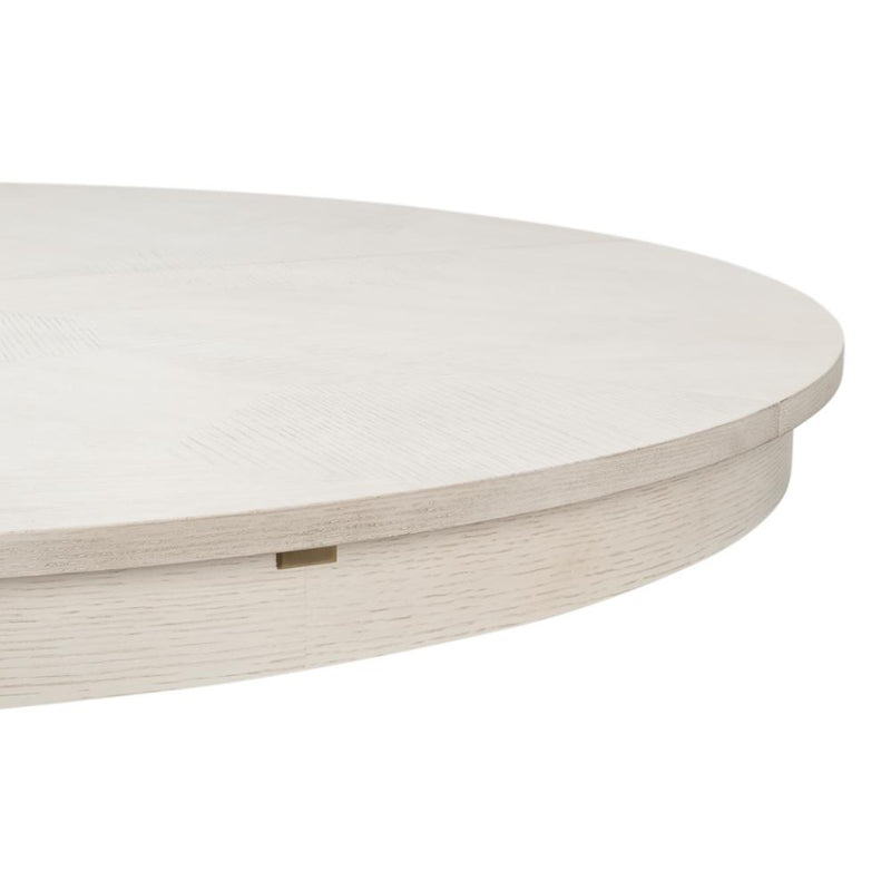 Close-up of a round, white Giselle Jupe table by Sarreid, Ltd., featuring transitional styling and a smooth finish.