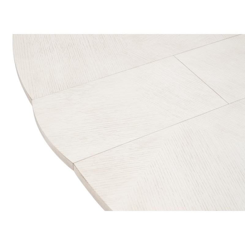 Close-up of a Giselle White Finish Jupe table by Sarreid, Ltd., featuring transitional styling and a visible seam.