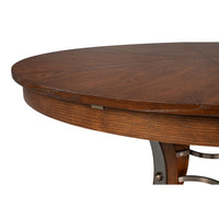 Close-up of Sarreid, Ltd. Tower Palladio Finish Medium Jupe Dining Table with sleek metal accents underneath.