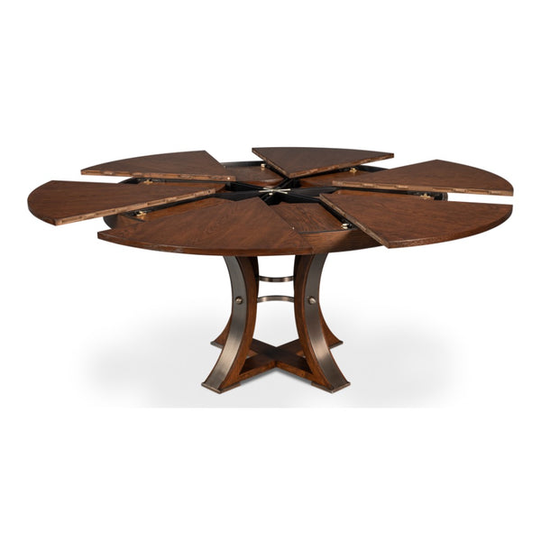 Sarreid, Ltd. Tower Palladio Finish Medium Jupe Dining Table shown partially extended to reveal hidden extensions.