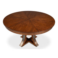 The Tower Palladio Finish Medium Jupe Dining Table by Sarreid, Ltd. features a unique crossed pedestal base.
