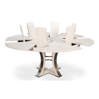 Sarreid, Ltd.’s Tower Working White Finish Medium Jupe Dining Table with leaf panels partially opened for expansion.