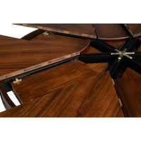 Close-up of the Sarreid, Ltd. Soho Brown Finish Large Jupe Dining Table with partially opened star-shaped panels.