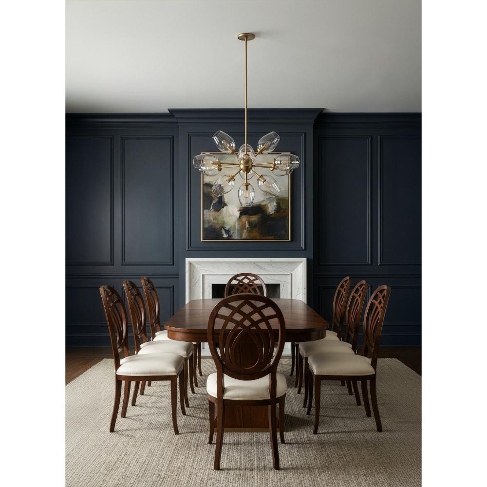 Dining room with wooden table and chairs against a dark blue wall.