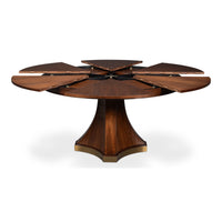 A round wooden dining table with a pedestal base and multiple extendable leaf-shaped tabletops, shown open on a plain white background.