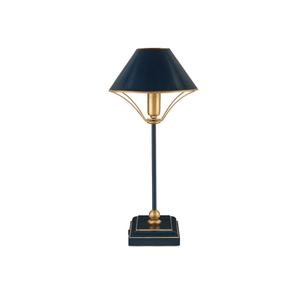A table lamp with a dark navy blue shade and base accented with gold trim and gold-toned metal details, set against a plain white background.