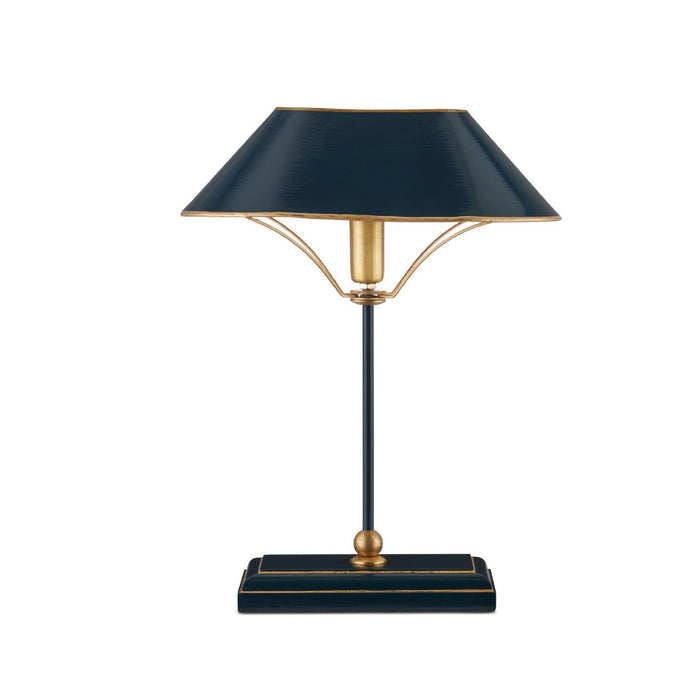 A modern table lamp with a dark navy blue shade and base accented by gold metal details, set against a plain white background.