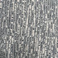Textured navy and white patterned fabric