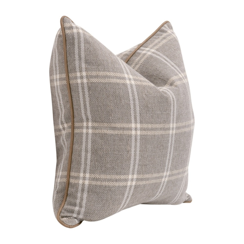 Plaid patterned pillow with a brown border on a white background