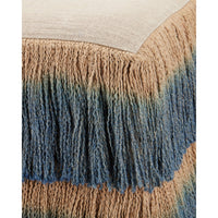 Close up of corner view of jute and blue fringe ottoman