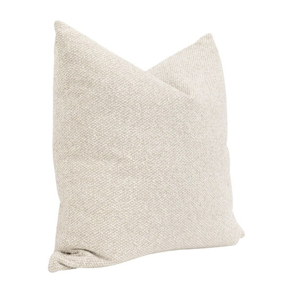 Textured beige pillow on a white background