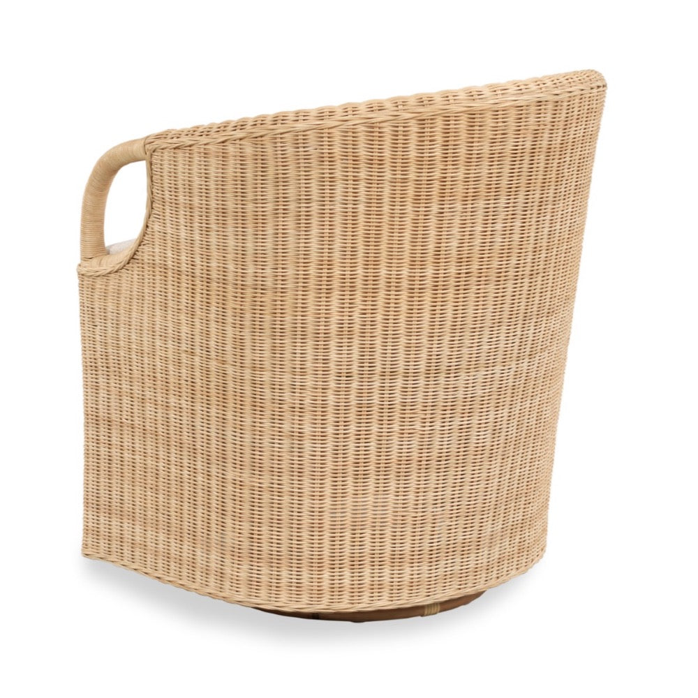 A natural woven rattan storage basket with a single integrated side handle, shown from a three-quarters angle on a white background.