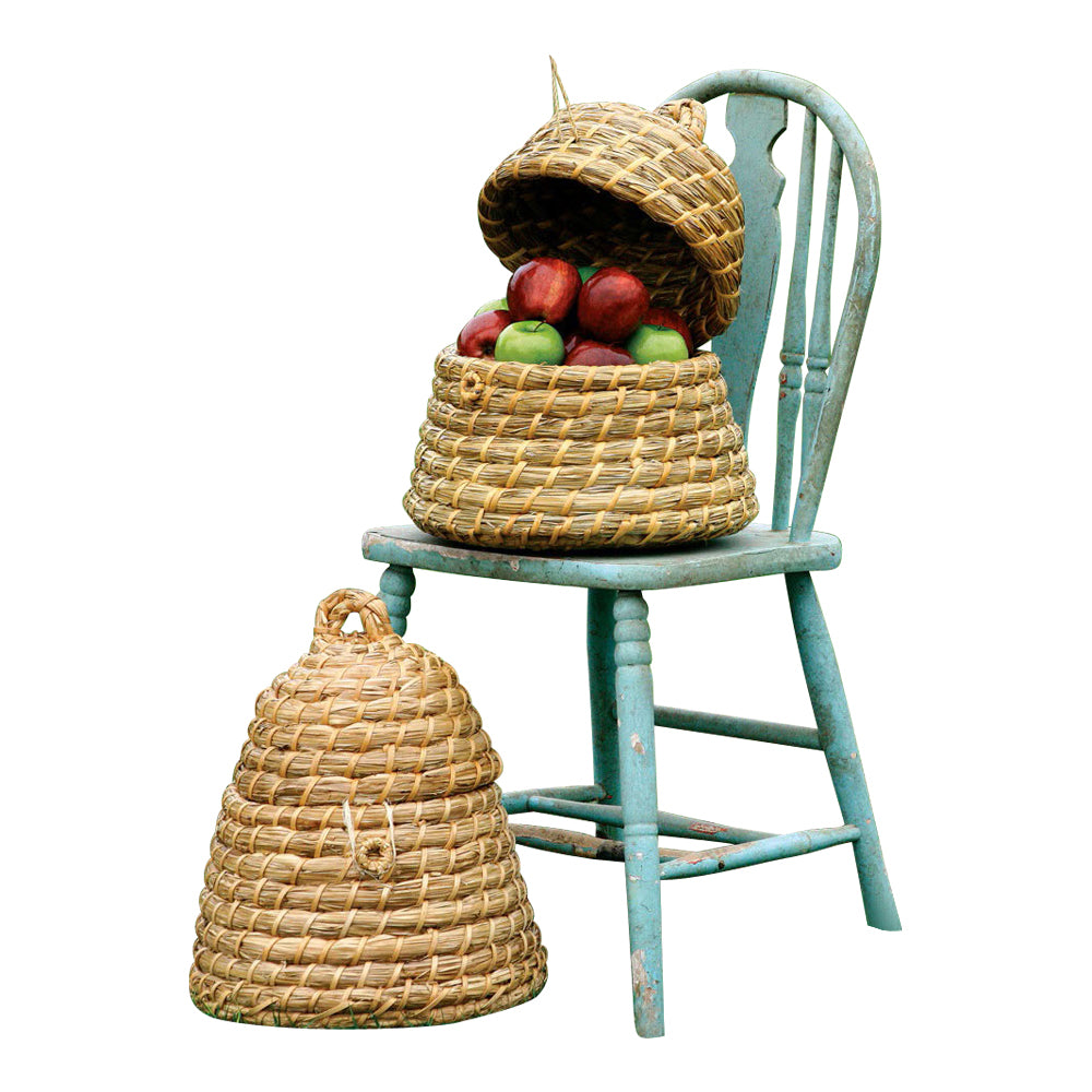 Woven baskets with fruits on a light blue chair against a white background
