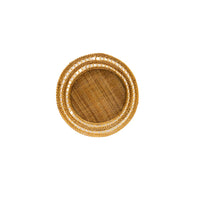Small Round Woven Rattan Basket by Varnish Collection, shown overhead on a white background.