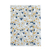Anna Blue + Dijon block print fabric sample in floral blue and orange on beige; pinked edges. Allem Studio.