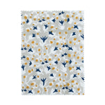 Anna Blue + Dijon block print fabric sample in floral blue and orange on beige; pinked edges. Allem Studio.