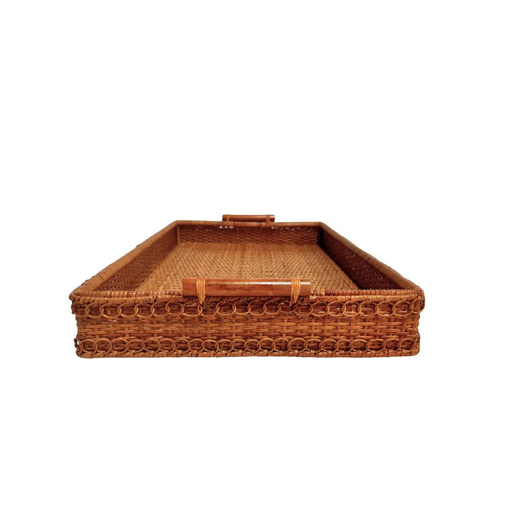 Side view woven rattan tray with handles on a white background