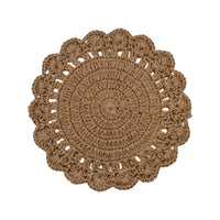 A round, hand-crocheted placemat in a warm brown color, featuring a scalloped edge and intricate openwork patterns, shown flat against a solid white background.