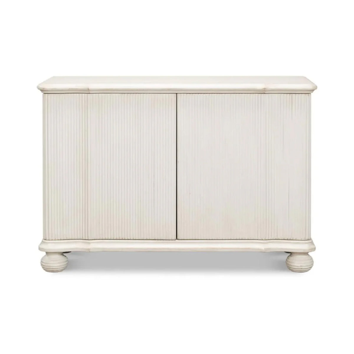 Astrid Entrance Commode Antique White Cabinet by Sarreid, Ltd. features fluted details and round feet in reclaimed pine.