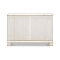 Astrid Entrance Commode Antique White Cabinet by Sarreid, Ltd. features fluted details and round feet in reclaimed pine.