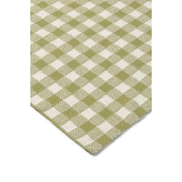 Green and white checkered pattern on a beige background