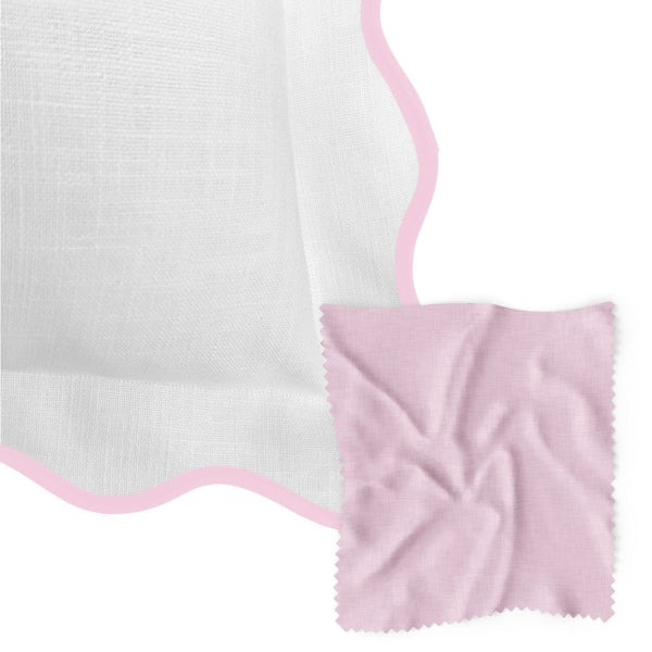 The Scalloped Pink + White Duvet Cover from Laura Park Designs adds sweet charm to any girl's room.