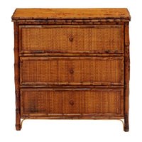 Kenian's Tortoise Shell Bamboo + Rattan Bedside Chest is a vintage wood dresser with three drawers and rustic design.