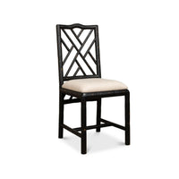 Brighton Bamboo Black Side Chairs (set of 2) by Sarreid, Ltd. feature geometric backs and light beige cushions.