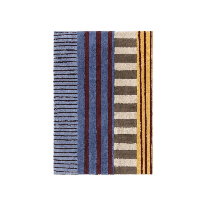 A rectangular area rug with a vertical striped pattern featuring blue, brown, beige, and yellow tones, shown flat against a solid white background.