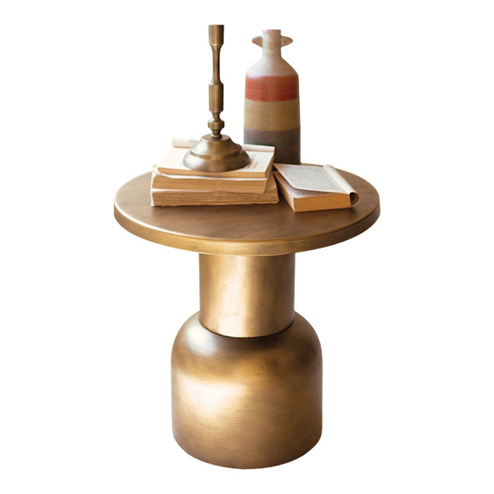 Small round table with a gold base and wooden top, featuring books and a vase on a white background.