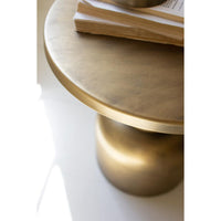 Gold round table with a white base on a white background