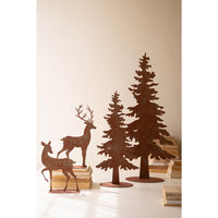 Rust color metal sculptured trees and deer on stands
