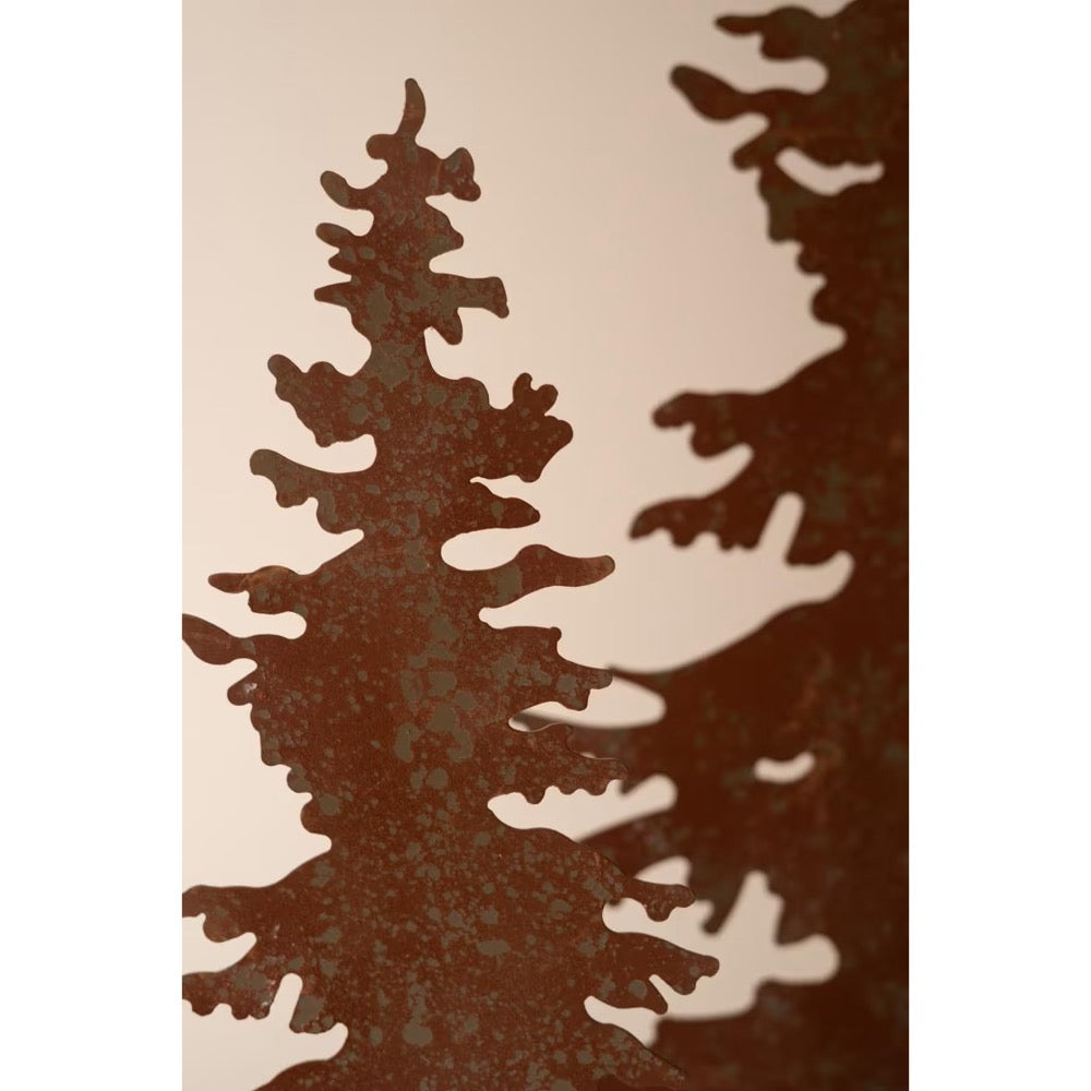 Close up rust color metal sculptured trees 