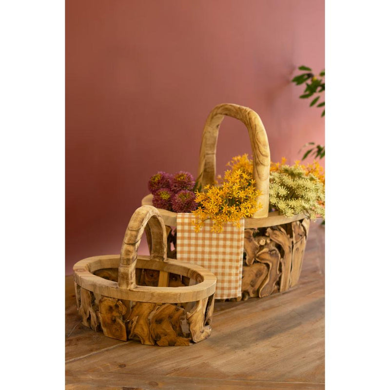 Kalalou Driftwood Baskets with Handles are displayed on a recycled driftwood table against a warm-toned background.