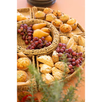 Baskets of grapes and pastries on a table
