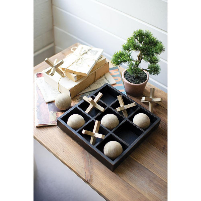 wooden tic-tac-toe set with black board