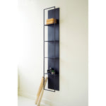 tall black metal four tiered wall shelf