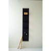 tall black metal four tiered wall shelf