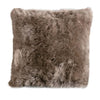A square Longwool Sheepskin Pillow by Auskin with a luxurious alpine-lodge-style soft brown texture.
