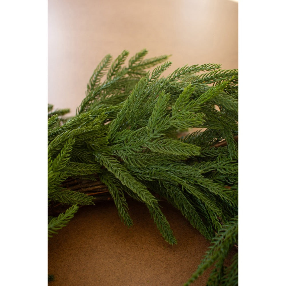 green faux fir wreath