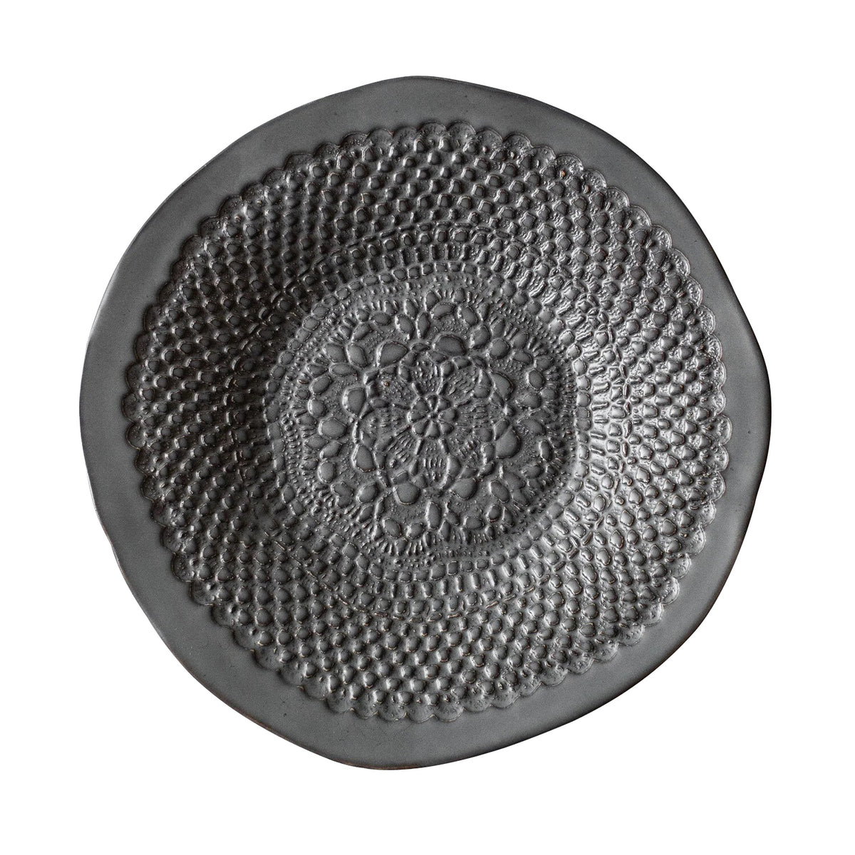 The Chamberlin Ceramic Platter from Handmade Studio features a round, organic design with intricate lace-like patterns in the center, set against a white background. This elegant and textured ceramic plate is the perfect handmade gift.