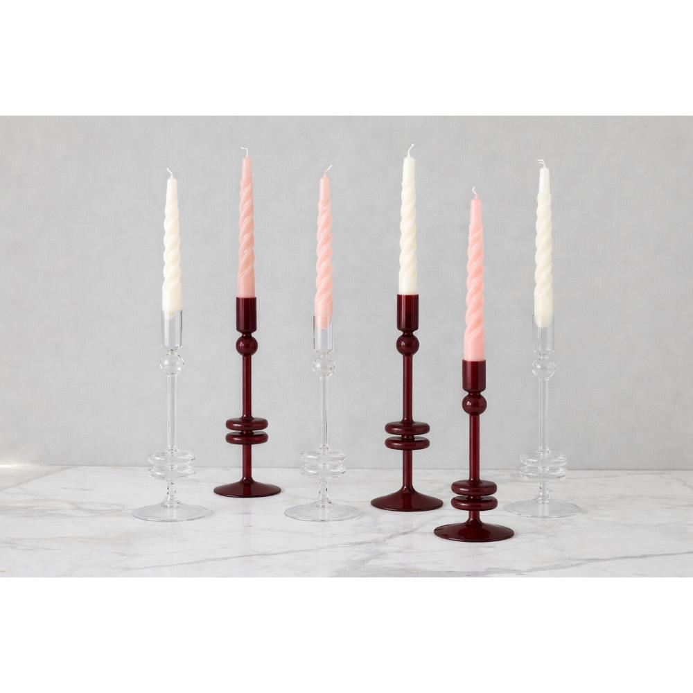 Set of candlesticks with candles on a gray background