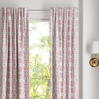 Chintz Rose Curtain Panels by Laura Park Designs in pink and white, made from a soft cotton microfiber blend.