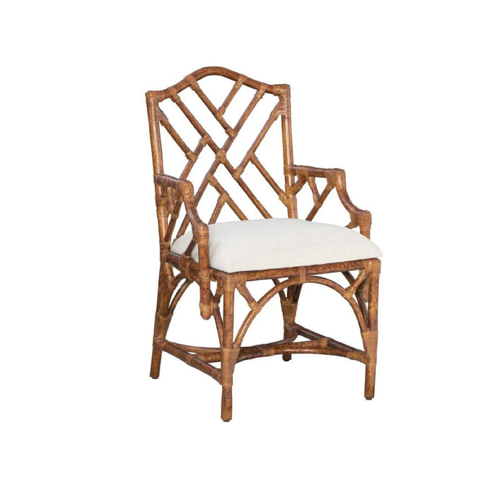 The Kenian Chippendale Tortoise Finish Dining Chair features a geometric back and white cushion for an antique look.