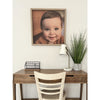 thin oak photo frame on wall