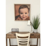 thin oak photo frame on wall