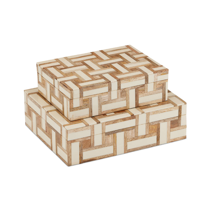 Two decorative boxes with a geometric pattern on a white background